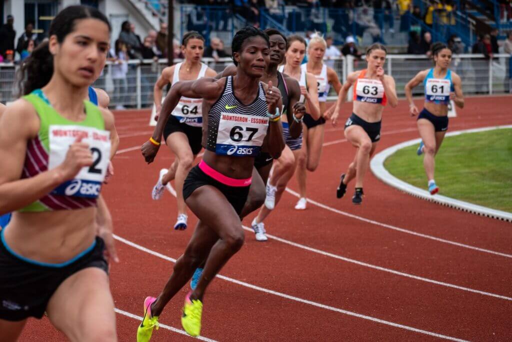 woman running competition over the average 400 meter time by age