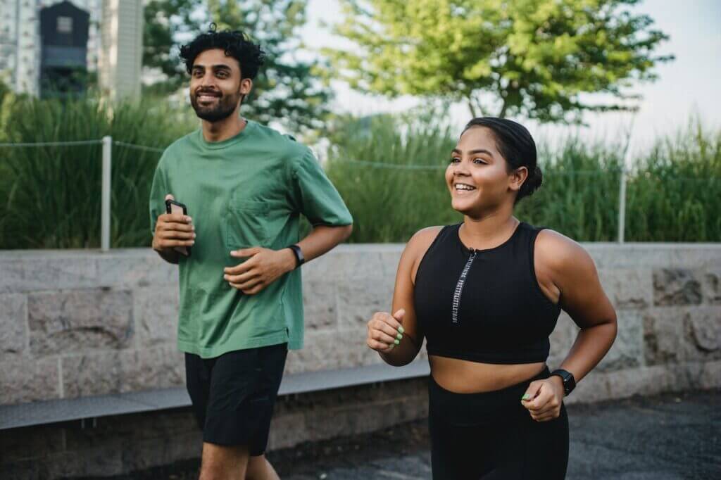 A man and a woman experimenting the benefits of jogging every day