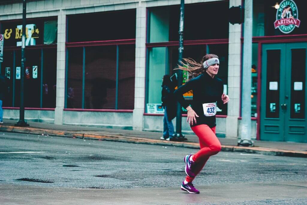 Female long-distance runner running an event