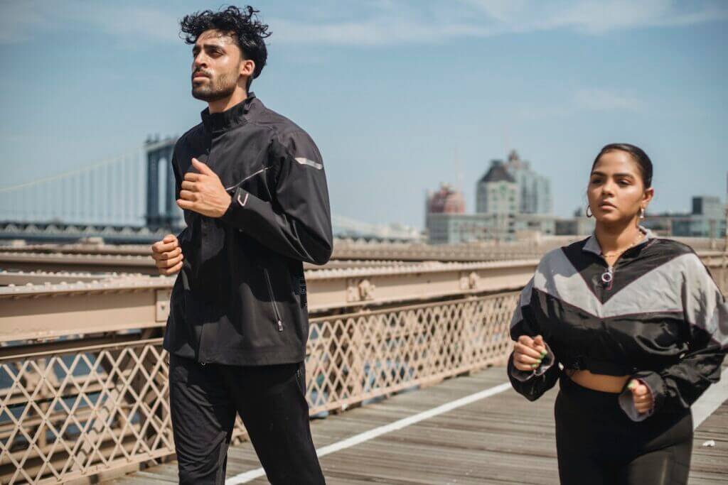 man and woman training for a 6 mile run