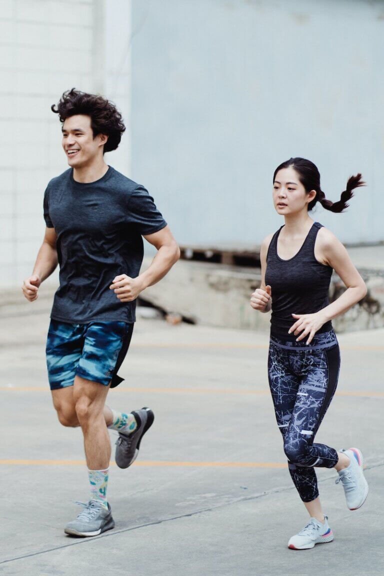 A Man and a Woman Running